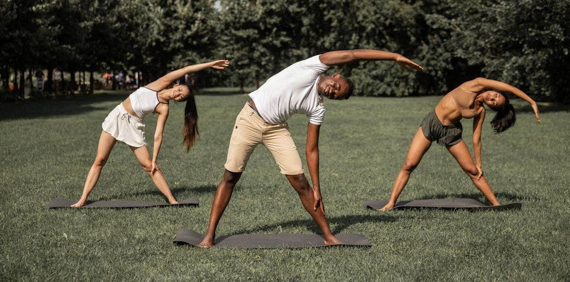 people exercising in the park 
