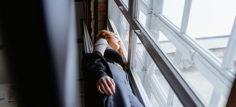 Person looking through the window.