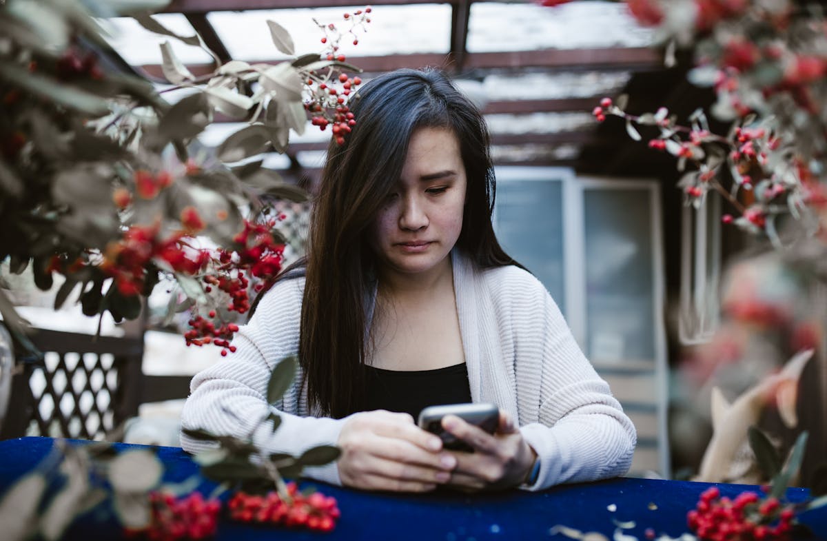 Person watching porn on phone.