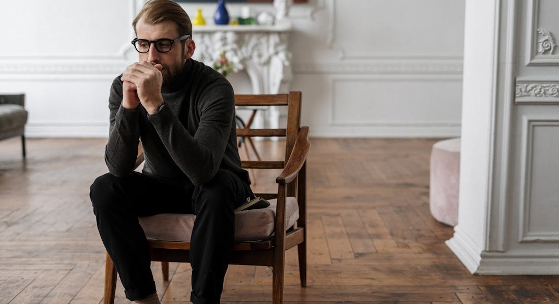 a man sitting on a chair