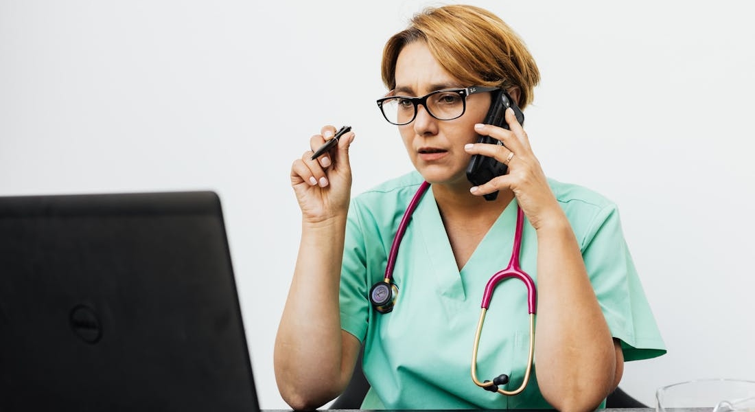 a doctor talking over the phone