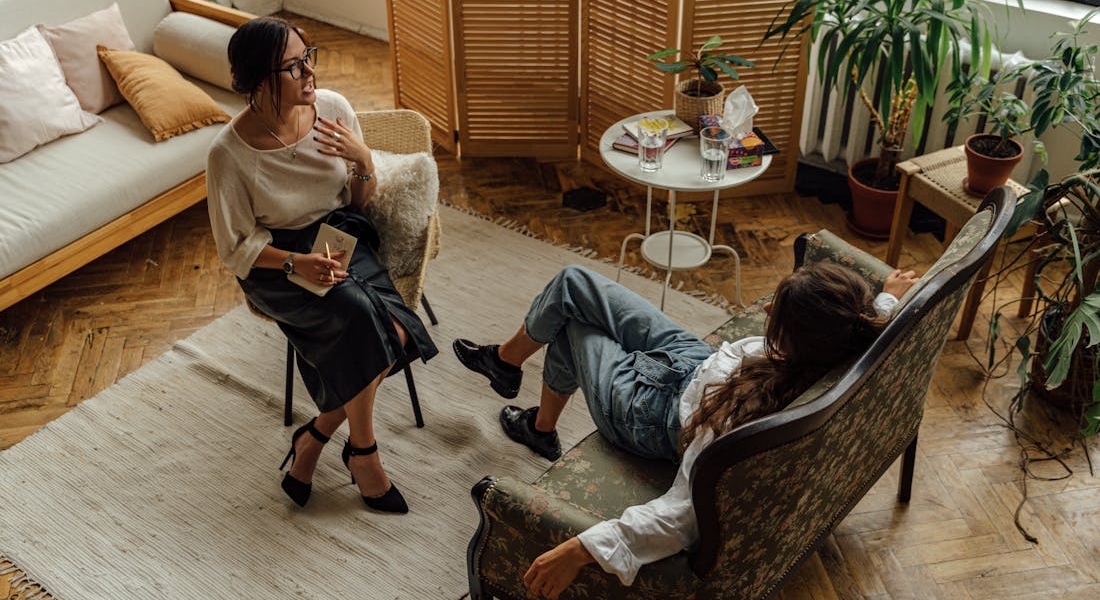two woman talking about addiction and mental health treatment in Maryland